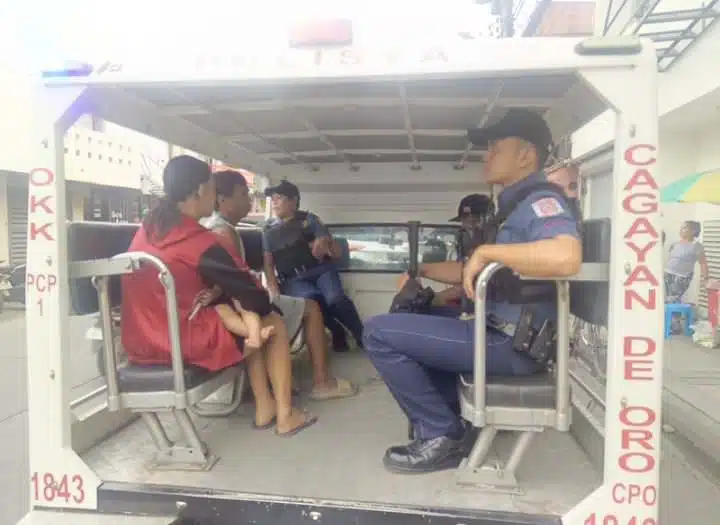 Suspect being escorted by Police Station 1 personnel after arrest, Authorities respond quickly to viral stabbing incident in Cagayan de Oro, Knife recovered from suspect involved in viral Pabayo Street altercation